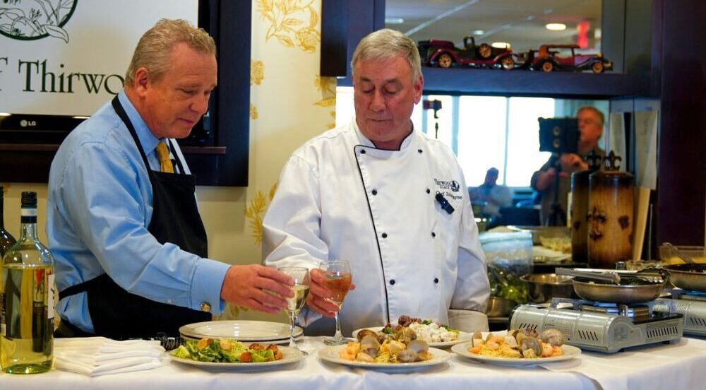 a slice of quiche on a white plate